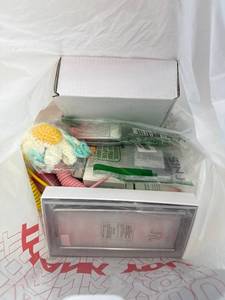 lot 411418 image: 15 Item Mystery Bag (misc. makeup, phone accessories, electronics, toys, stuffed animals, keychains, household items, etc.)