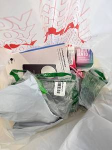 lot 411421 image: 15 Item Mystery Bag (misc. makeup, phone accessories, electronics, toys, stuffed animals, keychains, household items, etc.)
