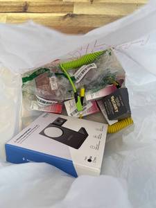 lot 411422 image: 15 Item Mystery Bag (misc. makeup, phone accessories, electronics, toys, stuffed animals, keychains, household items, etc.)