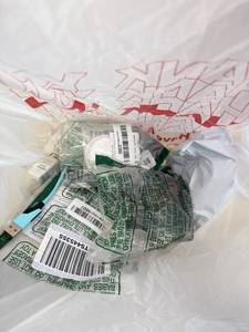 lot 411426 image: 15 Item Mystery Bag (misc. makeup, phone accessories, electronics, toys, stuffed animals, keychains, household items, etc.)