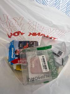 lot 411434 image: 15 Item Mystery Bag (misc. makeup, phone accessories, electronics, toys, stuffed animals, keychains, household items, etc.)