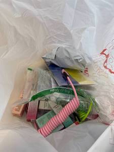lot 411435 image: 15 Item Mystery Bag (misc. makeup, phone accessories, electronics, toys, stuffed animals, keychains, household items, etc.)