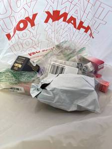 lot 411439 image: 15 Item Mystery Bag (misc. makeup, phone accessories, electronics, toys, stuffed animals, keychains, household items, etc.)