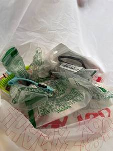 lot 411448 image: 15 Item Mystery Bag (misc. makeup, phone accessories, electronics, toys, stuffed animals, keychains, household items, etc.)