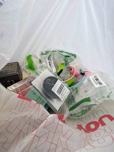 lot 411449 image: 15 Item Mystery Bag (misc. makeup, phone accessories, electronics, toys, stuffed animals, keychains, household items, etc.)