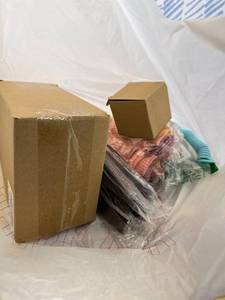 lot 411456 image: 15 Item Mystery Bag (misc. makeup, phone accessories, electronics, toys, stuffed animals, keychains, household items, etc.)
