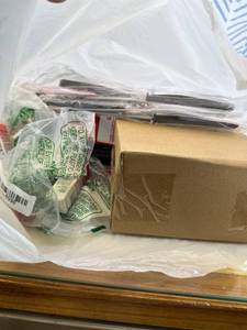 lot 411457 image: 15 Item Mystery Bag (misc. makeup, phone accessories, electronics, toys, stuffed animals, keychains, household items, etc.)