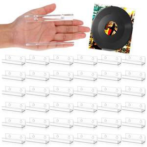 lot 22983 image: 24 Pack 4 Inch Vinyl Record Shelf Wall Mount, Vinyl Record Shelf, Record Shelves Display Daily Listening and Decorate Your Office or Home (Clear) - Retail $12