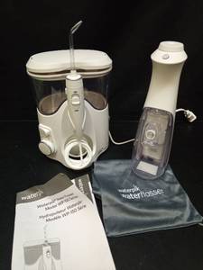 lot 1018 image: Waterpik WP-150 Series Water Flosser Complete Set - Retail $45