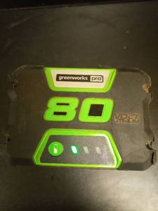 lot 1059 image: Greenworks Pro 80V 4Ah Lithium Ion Battery, TESTED DOES NOT CHARGE SHOWS RED ON CHARGER - Retail $180