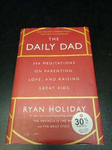 lot 1160 image: The Daily Dad by Ryan Holiday - 366 Meditations on Parenting Book - Retail $12