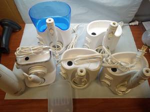 lot 1168 image: FOR PARTS ONLY  Water Flosser Collection - Multiple Units with Reservoirs - Retail $25