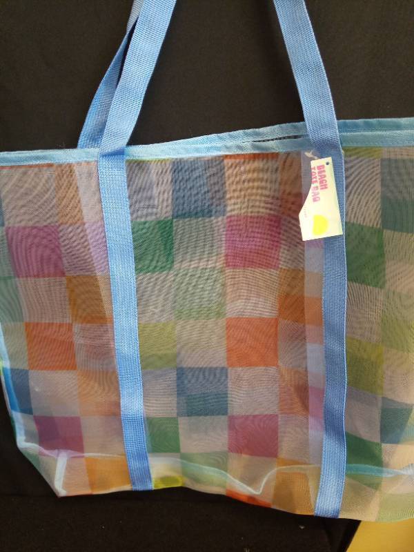 lot 2052 image: Transparent Mesh Storage Bag with Colorful Patchwork Design - Retail $12