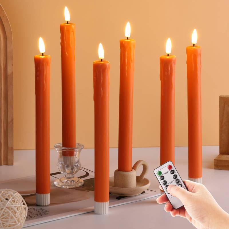lot 2098 image: Eywamage Orange Dripping Wax Flameless Taper Candles with Remote, Flickering LED Wax Candlesticks Halloween Fall Decor Set of 2 Retail $9.99