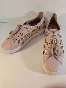 lot 143 image: Michael Kors Pink Cut-Out Leather Sneakers Size 10