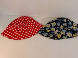 lot 190 image: Cotton Bucket Hats Set - Red Polka Dot and Black Floral Pattern