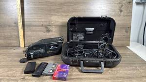 lot 110 image: Canon E700 8mm Hi8 Camcorder with Case and Accessories
