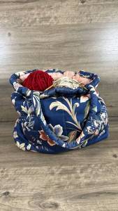 lot 135 image: Floral Fabric Knitting Bag with Yarn and crochet needles  Needles