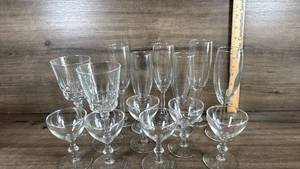 lot 225 image: Mixed Glassware Set with Champagne Flutes and Sherbet Glasses