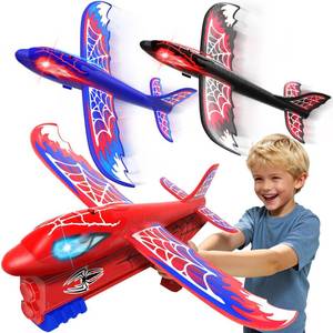 lot 57747 image: Cool Airplane Launcher Toy with Glowing Eyes & Web-Pattern Wings,2 Flight Modes Outdoor Games for Kids, Boys Toys Age 3-12,Birthday Gifts for 3 4 5 6 7 8 9 10 11 12 Year Old,Kids Gift(Red&Blue&Black) - Retail $23