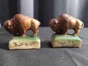 lot 5186 image: Boot Hill and Dodge City Buffalo Salt and Pepper Shakers