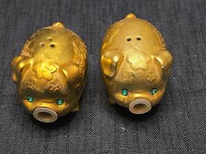 lot 5503 image: Golden Pig Salt and Pepper Shakers with Green Crystal Eyes