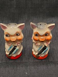 lot 5504 image: Ceramic Pig Salt and Pepper Shakers with Pink Ruffles