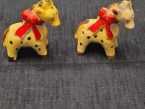 lot 5517 image: Ceramic Horse salt and pepper shakers with Red Ribbons Set of 2