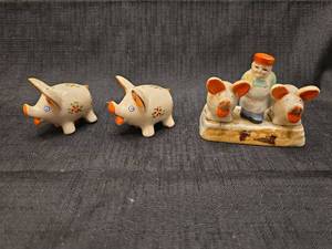 lot 5548 image: Ceramic Pig Salt and Pepper Shakers with Farmer Figurine