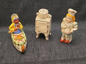 lot 5579 image: Ceramic Salt and Pepper Shaker Set with Native American Figurine and Miniature Stove