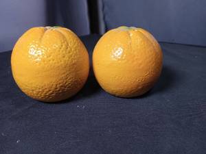 lot 40820 image: Ceramic Orange Salt and Pepper Shakers with Faces