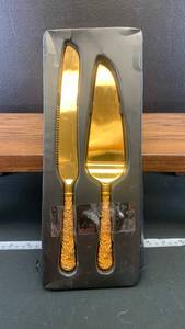 lot 40509 image: Gold Plated Wedding Cake Knife and Server Set