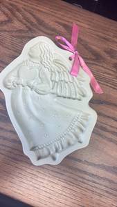 lot 5481 image: Brown Bag Cookie Art Ceramic Girl Cookie Mold