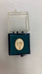 lot 5356 image: Gold Tone Pin Badge with Ornamental Design in Display Case