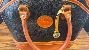 lot 5437 image: Dooney & Bourke All Weather Leather Handbag