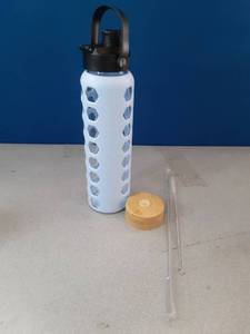 lot 321 image: 32 Ounce Glass Water Bottle, Two Lids,Wooden Lid Cracked - Retail $0