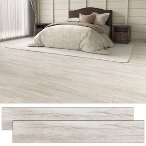 lot 2077 image: 54 Sq.Ft. Peel and Stick Vinyl Floor Tiles 36 x 6 Wood Look Planks, 36 Pack Waterproof Self-Adhesive Flooring Tiles, DIY for Renter, Kitchen, Living Room, RV, Washed White - Retail $55