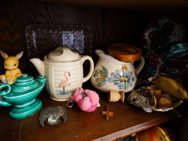lot 14607 image: Lot of figurines, bell, 2 tea pots, glass duck, etc.