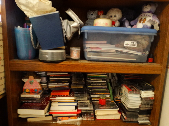 lot 14642 image: Lot of cds and cassette tapes, books, beanie babies, pens and pencils and more.