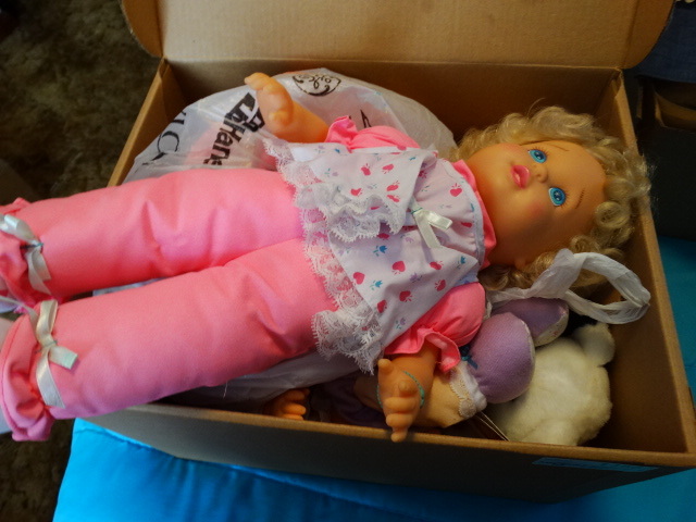 lot 14664 image: Lot of dolls and doll clothes.