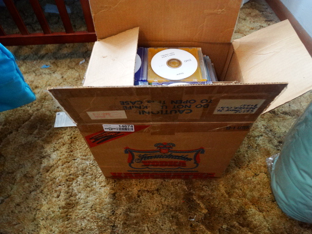 lot 14674 image: Large lot of DVDs.