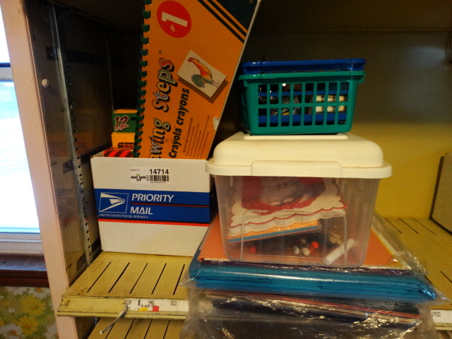 lot 14714 image: Lot of crayons, color pencils, color paper, baskets, pencils, & more.