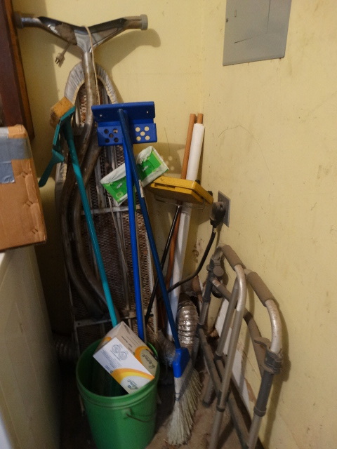 lot 14785 image: Lot with mops, broom, swiffer, bucket, iron board, walker.