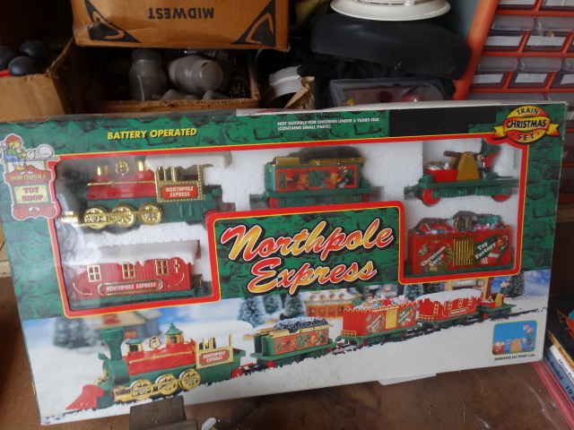 lot 14822 image: North pole express christmas train set battery operated, annimated elf pump car.