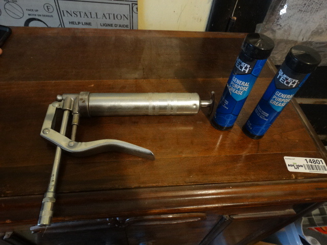 lot 14839 image: Grease gun with 2 tubes of grease.