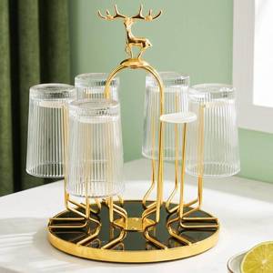 lot 1061 image: Pumtus Rotating Cup Drying Rack Stand, 6 Cups Drinking Glass Holder, Non-Slip Steel Mug Drainer Organizer, Glass Cup Stand with Silicone Protective Hooks, Tumbler Dryer Tree for Kitchen, Countertop - Retail $22