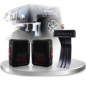 lot 1146 image: Xprite Smoked Lens Red LED Tail Lights wTurn Signal & Back Up & Smoke 3rd LED Brake Light Assembly Compatible with Jeep Wrangler JK JKU 2007-2018 - Retail $68