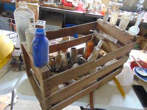 lot 4926 image: Wooden fruit crate full of antique bottles