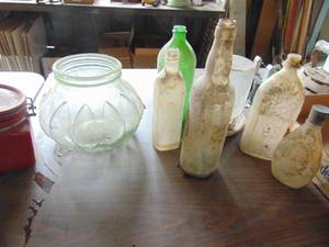 lot 4927 image: Old bottles, waterer and watering jar
