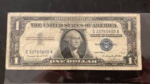 lot 1 image: One Dollar Silver Certificate Blue Seal Series 1957 A Serial number C33760605A